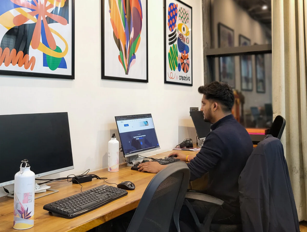 A Boy working on office Pc